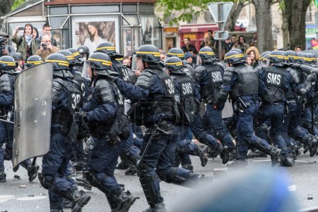Photo for Crowded riots during labour demonstration in Paris France - Royalty Free Image