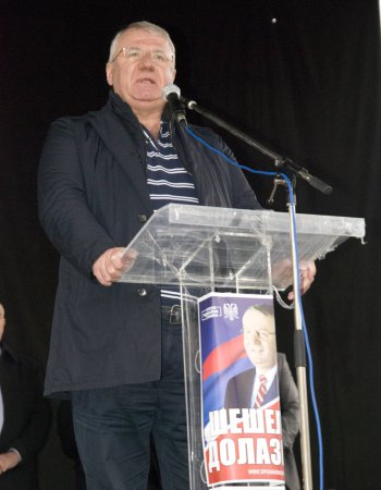 Photo for SERBIA, Vrsac: Former Serbian deputy PM Vojislav Seselj, who was trialed by the Hague Tribunal, is seen before a rally in Vrsac on April 10, 2016, as part of his election campaign in Serbia. - Royalty Free Image