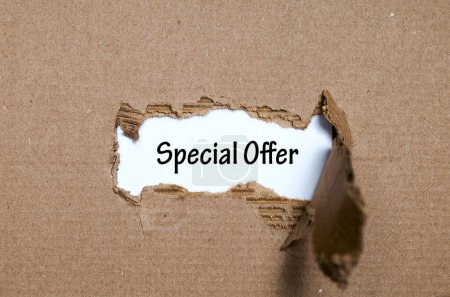 Photo for The word special offer appearing behind torn paper - Royalty Free Image