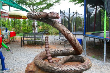 Foto de Anillo de hierro serpientes de cascabel HUN LEK KORAT en Nakhon Ratchasima, Tailandia. - Imagen libre de derechos