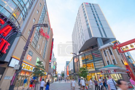 Photo for Tokyo, japan - people walking at the street with a lot of colorful neon lights in the city - Royalty Free Image