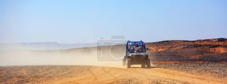 Photo for Off road car with it's pilot in Morocco - Royalty Free Image