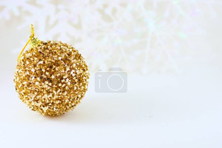 Photo for Golden Xmas ball, beautiful festive christmas card - Royalty Free Image