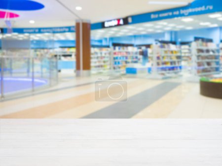 Photo for Empty table and shopping mall blur - Royalty Free Image