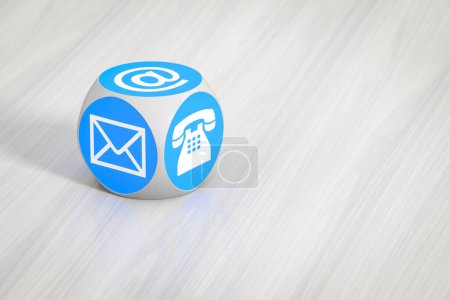 Téléchargez les photos : Cube turquoise avec signes pour téléphone e-mail et lettre - en image libre de droit