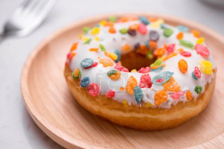 Photo for "Plate with delicious donuts on marble background." - Royalty Free Image