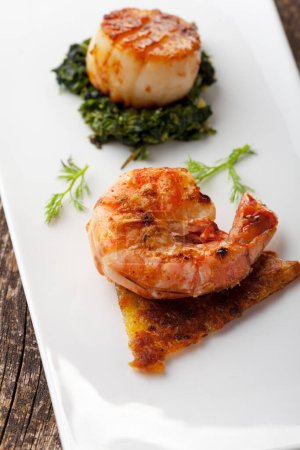 Photo for Closeup of a grilled shrimp on a hash brown - Royalty Free Image