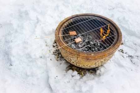 Photo for "BBQ Snacks in Cold Winter" - Royalty Free Image