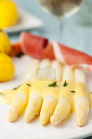 Photo for "white asparagus with ham on a plate " - Royalty Free Image