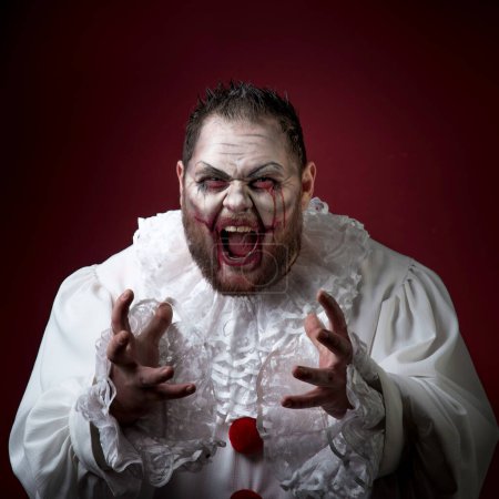 Téléchargez les photos : Scary Evil Clown vue de fond - en image libre de droit