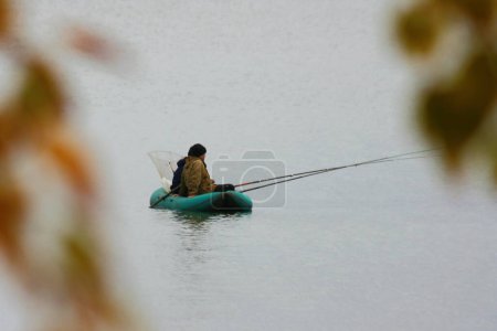 Photo for Fishing in boat on water lake - Royalty Free Image