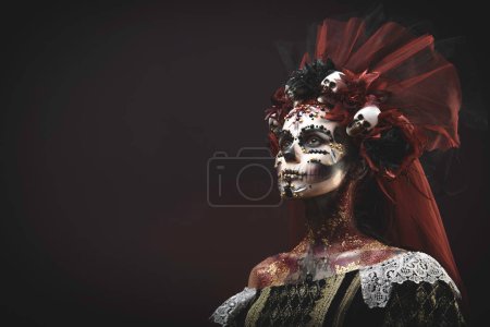 Photo for Young girl in the image of Santa Muerte - Royalty Free Image
