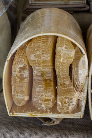Photo for "Fresh honey in the sealed comb frame" - Royalty Free Image