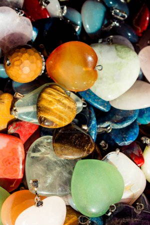Photo for "Heart shaped semi precious stones in view" - Royalty Free Image
