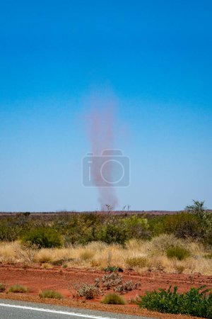 Photo for Big landspout whirlwind sand tornado dust devil in Australian dessert - Royalty Free Image