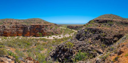 Photo for Mandu Mandu Gorge with dry river bed leading into Indian Ocean at Cape Range National Park Australia - Royalty Free Image