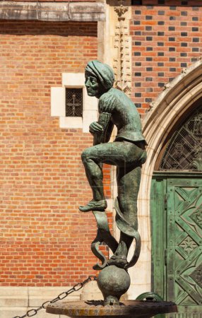 Photo for Bronze statue of a poor student near St Mary's Basilica located - Royalty Free Image