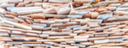 Photo for "Defocused background with stack of wood" - Royalty Free Image
