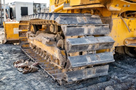 Photo for Metal Tracks on a Bulldozer on Construction Site - Royalty Free Image