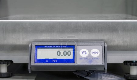 Photo for "Commercial Digital Shipping Weight Scale in the Office." - Royalty Free Image