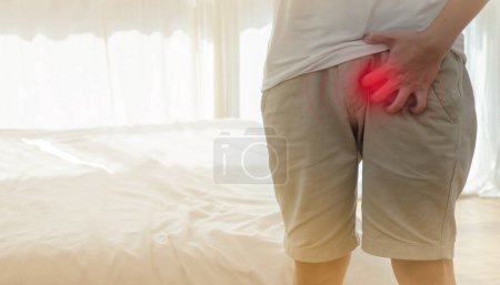 Photo for Young Asian man suffering from pain. Health problem concept - Royalty Free Image