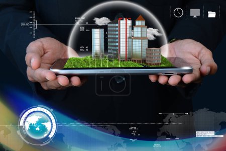 Photo for Man holding a cityscape in tablet computer - Royalty Free Image