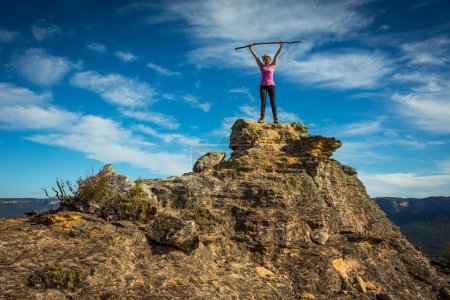 Photo for "Standing on top of rocky pillar in Gardens of Stone in NSW Australia" - Royalty Free Image