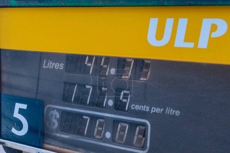 Photo for "ULP unleaded petrol high prices in Australian bush close to Tom Price" - Royalty Free Image