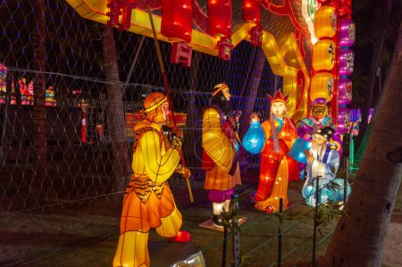 Photo for Scenic shot of beautiful illuminated figures in park at night - Royalty Free Image