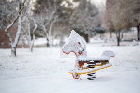 Photo for "Child playground equipment covered in snow in Oberon" - Royalty Free Image