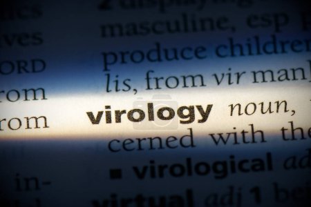 Photo for Virology word in dictionary - Royalty Free Image