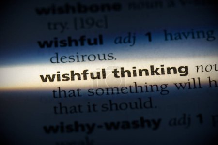 Foto de Wishful pensamiento palabra, resaltado en el diccionario, vista de cerca - Imagen libre de derechos