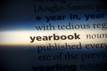 Photo for Yearbook word, highlighted in dictionary, close up view - Royalty Free Image