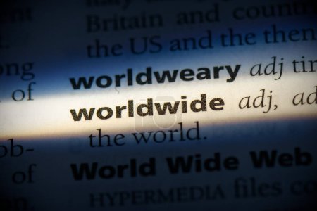 Téléchargez les photos : Mot mondial, surligné dans le dictionnaire, vue de près - en image libre de droit
