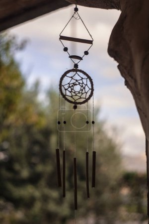 Photo for Dreamcatcher hung on blurred background - Royalty Free Image
