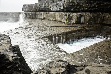 Photo for The famous "Wormhole" in Inishmore, Aran Islands, ireland - Royalty Free Image