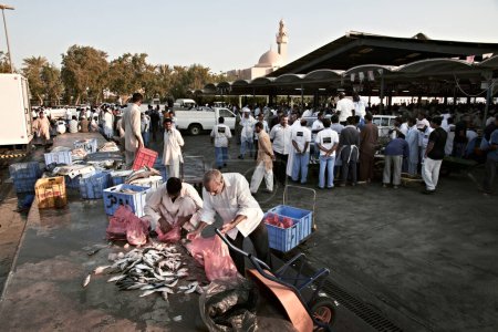 Photo for Fishermen sell fresh fish at the daily fishmarket - Royalty Free Image