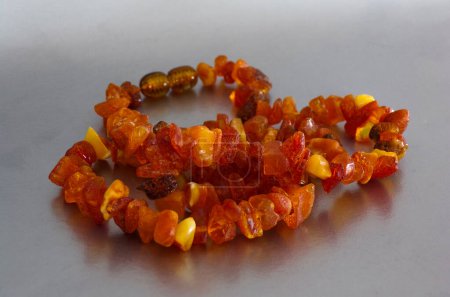 Photo for Beautiful beads made of natural stone amber - Royalty Free Image