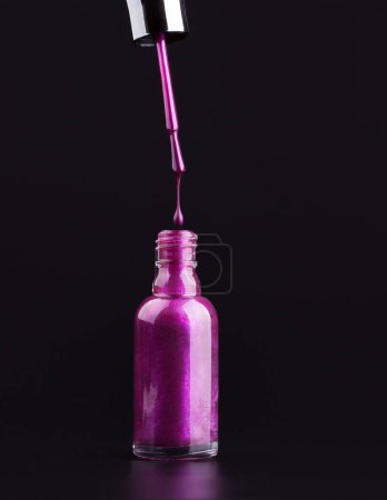 Photo for Bottle of purple nail polish - Royalty Free Image