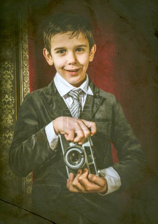 Photo for Child taking pictures with vintage camera - Royalty Free Image