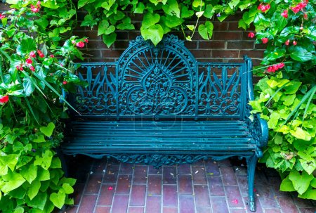 Photo for Antique blue metal bench. - Royalty Free Image