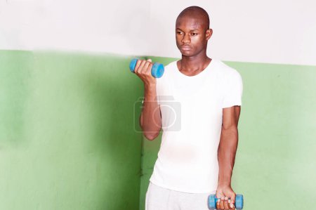 Photo for Weight lifting in the studio - Royalty Free Image