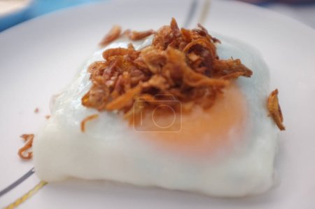 Photo for A world renowned delicacy from Sakon Nakhon , Thailand . Steamed rice-skin dumplings with egg or vietnamese steamed rice noodle - Royalty Free Image