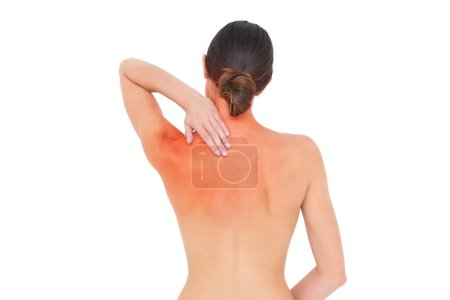 Photo for Rear view of a topless fit woman with shoulder pain - Royalty Free Image