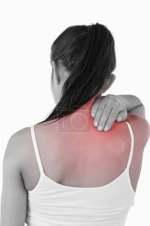 Foto de Vista posterior de la mujer con dolor en el cuello - Imagen libre de derechos