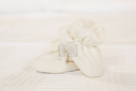 Photo for Infant shoes on white background - Royalty Free Image