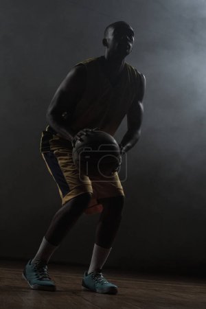 Photo for Portrait of basketball player preparing to score - Royalty Free Image