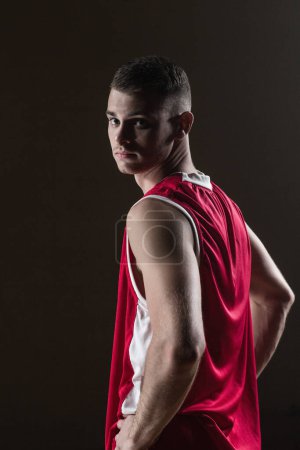 Photo for Portrait of basketball player front the back posing and looking the camera - Royalty Free Image