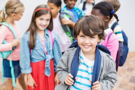 Photo for Group of kids standing on school terrace - Royalty Free Image