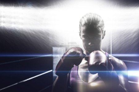 Photo for Portrait of woman fighter with gloves - Royalty Free Image